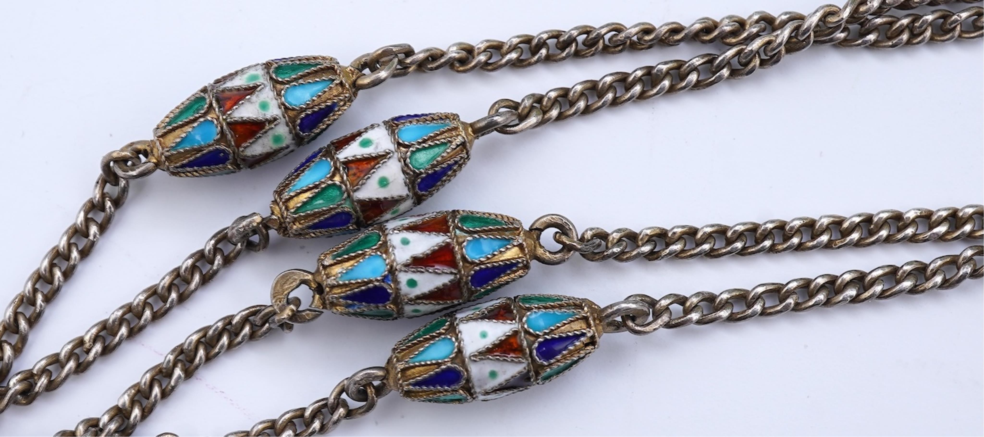 A silver and enamel long chain necklace, Russia, early 20th century